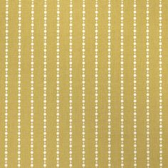 a yellow and white striped fabric with small dots on the bottom, in rows of vertical stripes