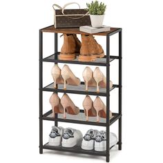 four tier shoe rack with several pairs of shoes