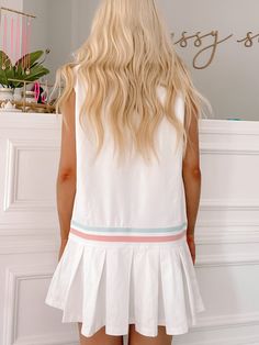 Serve up some style in the In It To Win It Dress from Sassy Shortcake! Look sharp in this ivory tennis dress, complete with an athletic collared neck and striking pink and blue stripes. This cutie has all the right features to help you ace your look fit: true to size, model wearing a size small. content: 95% cotton 5% spandex care: hand wash cold Preppy Fitted Tennis Dress, Fitted White Tennis Dress With Short Sleeves, Casual Pink Sleeveless Tennis Dress, Sporty Pink Tennis Dress For Spring, Pink Sporty Tennis Dress For Spring, Sporty Short Sleeve Tennis Dress, White Preppy Tennis Dress For Spring, White Sporty Short Sleeve Tennis Dress, Sporty White Short Sleeve Tennis Dress