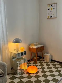 a room with a checkered floor and white walls