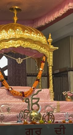 an elaborately decorated bed in a room