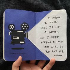 someone is holding up a book with an image of a robot on it and the words i know this is not a movie but i keep hoping in the end