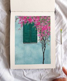 a painting of a tree with pink flowers and green shutters