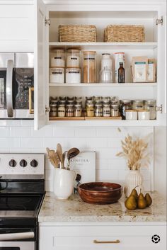 an organized kitchen with spice cabinet organization