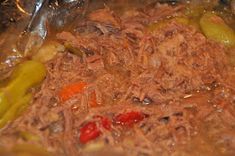 the meat and vegetables are being cooked in the pot on the stove top, ready to be eaten