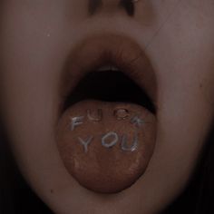 a woman's tongue with the words i love you written on it