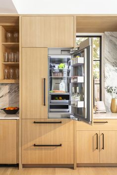 Modern, white and wood home design with innovative Dacor luxury refrigerator Paneled Kitchen, Luxury Refrigerator, Built In Fridge, Custom Kitchen Remodel, Kitchen Suite, Luxury Appliances, Kitchen Redesign