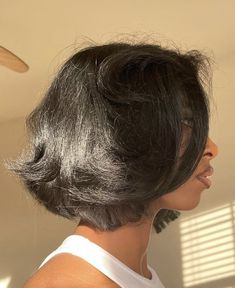 the back of a woman's head with grey hair