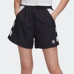 Women's Nwt Adidas Sleek And Sporty, Bold Back Large Oversized Trefoil Logo Shorts, Mid-High Rise, Adjustable Drawstring Waist, Mesh Lining, Slip-In Pockets, 100% Nylon Plain Weave, Color-Black/White, Size-Xs Adidas Shorts For Spring Streetwear, Adidas Spring Streetwear Shorts, Casual Adidas Shorts For Streetwear, Adidas Bottoms For Streetwear, Adidas Bottoms For Summer Streetwear, Adidas Summer Streetwear Bottoms, Trendy Adidas Bottoms For Summer, White Shorts With Three Stripes For Spring, White Three Stripes Shorts For Spring