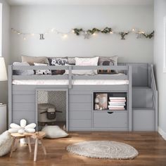 a loft bed is built into the side of a child's room