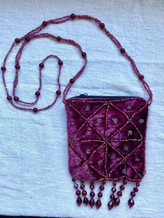 Gorgeous maroon beaded bag/pouch, the pouch is 4" x 4". Perfect for holding any little trinkets (crystals, herbs, stones, etc.) or whatever your heart desires. Whimsigoth Trinkets, Arcana Outfits, Aurora Outfit, Beaded Pouch Bag, Bag With Beads, Little Trinkets, Beaded Bag, Boho Bags