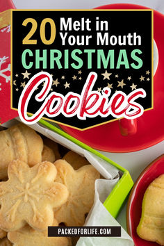 some cookies are in red bowls and on the table is a plate with christmas cookies