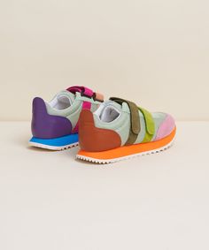 Our all time best-selling and compliment collecting retro inspired sneaker. Signature mismatch adorns the classic sport mesh uppers trimmed in colorful soft kid suede and nappa leather. Adjustable velcro closure, a 1” EVA wedge, and tapered toebox. Strap in and allow an extra half hour for your errands, you're going to be stopped a lot in these. Dopamine Design, Charlotte Stone, Art Shoes, Velcro Shoes, Mens Footwear, Fab Shoes, Swag Shoes, Retro Sneakers, By Charlotte