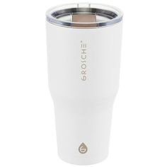 the white tumbler cup has a stainless steel lid and is holding a brown handle