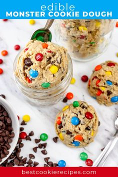 monster cookie dough in a glass jar with chocolate chips and m & m on the side