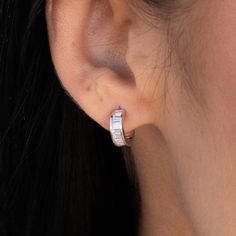 Introducing the Baguette Hoop Stud Earrings in White Gold, these earrings are the perfect staple hoops for layering. Whether you want to keep a minimalist look or stack our mini hoops, these earrings are perfect for everyone. Pair with our Baguette Ring in White Gold for a perfect match! This product is guaranteed for life – GLD will repair or replace the item should you experience any defects in craftsmanship or breakage. *Earrings sold in pairs* *14k Solid White Gold Posts* Specifications - 0. White Gold Baguette Cut Huggie Earrings, Elegant White Gold Baguette Cut Huggie Earrings, Classic Silver Baguette Cut Hoop Earrings, Classic Silver Baguette-cut Hoop Earrings, Timeless Baguette-cut Sterling Silver Diamond Earrings, Baguette Ring, Vermeil Jewelry, Custom Earrings, Single Earring