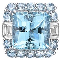 This collection features an array of aquamarines with an icy blue hue that is as cool as it gets! Accented with diamonds these rings are made in white gold and present a classic yet elegant look. 11.8 Carat Aquamarine, Rhodolite and Diamond Ring in 18 Karat White Gold. Aquamarine: 11.86 carat, 13.20X13.20X9.70mm size, Square Shape. Aquamarine: 1.625 carat, 3.20mm size, Round Shape. Rhodolite: 0.83 carat, 4.00mm size, Cabochons cut, Round Shape. White Diamond: 0.118 carat, 2.50mm size, round shap Formal Light Blue Diamond Ring, Formal Light Blue Aquamarine Diamond Ring, Luxury Light Blue Brilliant Cut Topaz Ring, Luxury Light Blue Ring With Brilliant Cut, Luxury Light Blue Brilliant Cut Ring, Luxury Light Blue Aquamarine Rings, Luxury Light Blue Topaz Ring With Center Stone, Luxury Light Blue Rings With Accent Stones, Luxury Aquamarine Diamond Ring With Prong Setting