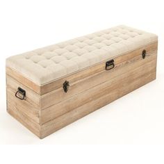 a large wooden box with tufted upholstered seat and handles on the lid