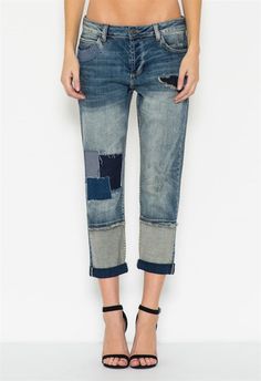 Designed for both comfort and style, this boyfriend jean is the ultimate win. Relaxed fit and an untacked cuffed hem for a slouchy look. Finished with destroyed detail mended with patches. 99% cotton/ Creative Jeans, Boyfriend Jean