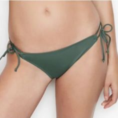 Nwt Victeoria's Secret Malibu Side-Tie Bikini Bottom Olive Green ** Price Is Firm. I Cannot Go Any Lower Due To Posh Fees.** Tie Up And Hit The Beach In This Sporty-Meets-Casual Bottom. Mix And Match With Tops To Find Your Perfect Swim Look. String Bikini Bottom Low Rise Adjustable Side Ties Moderate Back Coverage: Shows A Little, But Not All. Reliable Seller ~ Fast Shipping!! Casual Swimwear With Side Ties, Casual Tie-back Swimwear With Tie-side Bottom, Casual Victoria's Secret Swimwear For Vacation, Casual Tie-side Bottom Swimwear With Drawstring, Tropical Green Tie-side Swimwear Bottom, Victoria's Secret Tie-side Swimwear For Beach Season, Tropical Bra Friendly Tie-side Bottom Swimwear, Victoria's Secret Tie-side Swimwear, Victoria's Secret Tie-side Bottom Swimwear For Vacation