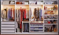 an organized closet with clothes and shoes