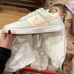 Nike Low Dunk In Pale Green And Crimson. Pastel Sneakers With Branded Insole And Round Toe, Nike Round Toe Pastel Sneakers, Nike Pastel Sneakers With Round Toe, Nike Low Dunk, Low Top Nikes, Nike Air Max Command, Nike Air Max 200, Nike Flight, White Casual Shoes