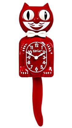 a red cat clock with big eyes on it's face and tail, sitting in front of a white background