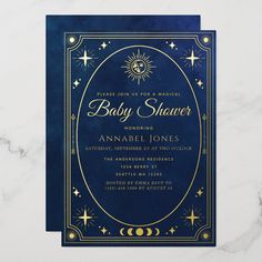 a baby shower is shown on the front of a blue and gold foiled card