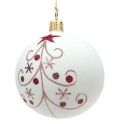 a white christmas ornament with red and gold designs on the top, hanging from a golden chain