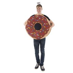 a man is holding a giant donut costume