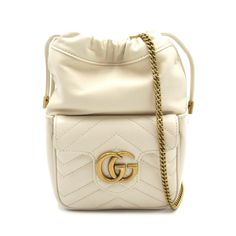 GUCCI GG Marmont Shoulder Bag  Brand: Gucci    Model: GG Marmont    Color: White    Material: Leather    Comes with: Box, Dust bag    Dimensions: 21cm x 13.5cm x 6.5cm    Serial number: 746433.0416    Country of origin: Italie      This item has been used and may have some minor flaws. Before purchasing, please refer to the images for the exact condition of the item.   A return request must be submitted within 48 hours after delivery. Customer is responsible for return shipping costs and fees. Estimated return shipping costs for this item are $80. Contact Our Customer Support for details.  This item ships internationally and will ship out within 3-5 business days.  We cannot confirm the time period listed. Gucci Gg Marmont Mini, Gg Marmont Mini, Gucci Mini, Hardware Logo, Luxurious Fashion, Mini Bucket Bags, Mini Bucket, Gucci Gg Marmont, Gucci Models