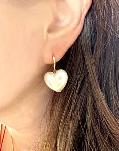 Large Heart acrylic Pearl Earrings, Heart dangling earrings, Gold huggie, Wedding Jewelry, Gift for her, Imitation Pearl jewelry, Lotus411 This Cute Puffy imitation(fake/acrylic) pearl dangling from a small gold hoop earrings is very charming. Great piece for a wedding party or daily wear. * Total Heart pearl Hoop earrings measures approx. 30mm * Imitation Acrylic Heart Pearl measures approx. 17.2mm x 19mm and 11.5mm Thick ---------------------------------------------------------------------- ** Heart-shaped Clip-on Earrings For Valentine's Day, Teardrop Heart Charm Earrings For Wedding, Elegant Dangle Huggie Earrings With Heart Charm, Mother's Day Heart Hoop Earrings, Mother's Day Heart-shaped Hoop Earrings, Valentine's Day Dangle Pearl Earrings For Pierced Ears, Huggie Heart Charm Jewelry For Wedding, Elegant Heart Charm Huggie Earrings For Valentine's Day, Single Heart Drop Earring For Anniversary