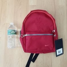 Brand New Version 1 Red Backpack With Zipper Closure For Outdoor Activities, Casual Gym Backpack For Back To School, Casual Backpack For Gym And Back To School, Red Nike School Bag, Nike Sports Backpack For Back To School, Sporty Red Outdoor Bag, Sporty Red Nylon Bag, Sporty Red Nylon Backpack, Red Sporty Outdoor Bag