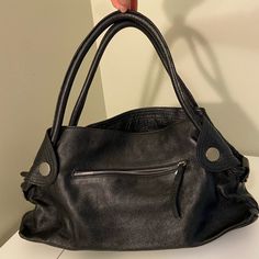 Tod’s Vintage Black Leather Shoulder Hand Bag Leather Silver Satchel For Everyday Use, Silver Leather Satchel With Silver-tone Hardware, Formal Black Hobo Bag With Silver-tone Hardware, Classic Black Hobo Bag With Palladium Hardware, Black Leather Hobo Bag With Silver-tone Hardware, Camel Leather Bag, Tods Bag, Suede Handbags, Black Leather Purse