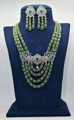 beautiful emeralds & american diamonds necklace with luxurious earrings with back screw.it is plated with 24ct gold. Luxurious Earrings, American Diamond Necklaces, Diamonds Necklace, 24 Karat Gold, Diamond Necklace Set, Luxury Earrings, Screw It, Uncut Diamond, American Diamond