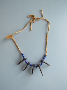 This Native American fake bear claw necklace is in good condition.  It still has the original tag attached. Free domestic shipping. Native American Bear, Bear Claw Necklace, Claw Necklace, Bear Claw, Bear Claws, Bead Necklaces, Indigenous People, Nativity, Native American