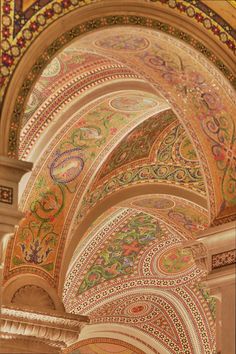 an intricately painted ceiling in a building