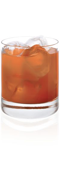 an orange drink in a glass with ice