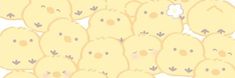 a bunch of little yellow chicks with faces drawn on them