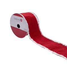 a roll of red and white ribbon on a white background