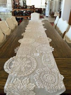 a long table with white lace on it