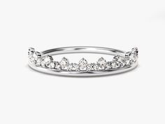 This beautifully crafted diamond crown ring is sure to shine with its brilliant accents and superb craftsmanship. With its special setting and high-quality materials, its sparkling diamond details will make the perfect statement. DETAILS: --Size Range: 2 US - 11 US--Weight (in 14k Gold): ~ 1.28 grams for Size 6.5 (Depends on the size)--Gold Kt Options: 14k and 18k--Color Options: Yellow Gold, Rose Gold and White Gold--Gemstone: Diamond--Diamond Cut: Round--Number of Stones: 27--Diamond Size: 9 x Crown Shaped Diamond Wedding Ring With Prong Setting, Luxury White Gold Ring With Crown Design, Luxury White Gold Rings With Crown Design, Elegant Rings With Crown Design, Elegant Round Crown Anniversary Ring, Crown Shaped Diamond Ring With Accents For Wedding, White Gold Crown Diamond Wedding Ring, Elegant Wedding Rings With Round Crown, Crown-shaped Diamond Ring With Diamond Accents