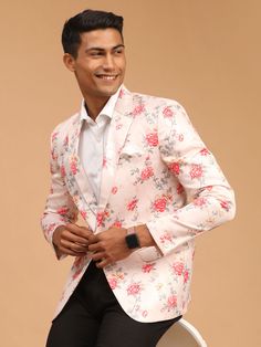 VASTRAMAY Men's Peach Floral Printed Blazer A stylish addition to your wardrobe, this men's peach floral printed blazer from VASTRAMAY is perfect for formal occasions or casual events. It features a unique floral print that adds a touch of elegance to your look. Key Features: Color: Peach Print: Floral Style: Blazer Occasion: Formal/Casual Specifications: Brand: VASTRAMAY Gender: Men Sleeve Length - Long Sleeves Top Shape - Straight Top Hemline - Straight Neck Notch Collar Jacket Pattern Printed Material & Care: Silk blend Dry Clean Legal Disclaimer: The product is guaranteed to be 100% genuine. Product images are for illustrative purposes only. Images/packaging/ labels may vary from time to time due to changes made by the manufacturer's manufacturing batch and location. The product descri Printed Long Sleeve Suits For Formal Occasions, Formal Printed Long Sleeve Suits, Formal Long Sleeve Printed Suit, Formal Blazer With Floral Print, Formal Floral Print Suits For Spring, Spring Formal Suit With Floral Print, Spring Floral Print Formal Suits, Spring Printed Long Sleeve Suits, Spring Printed Long-sleeved Suits