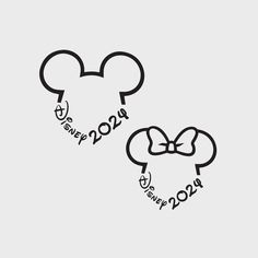 mickey and minnie mouse ears with the words disney world in black on a white background