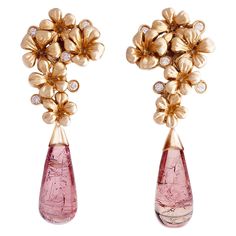 These contemporary Plum Blossom cocktail earrings are made in 18 karat rose gold and encrusted with 10 round diamonds and removable drops of natural rose tourmalines (about 16.4 carats in total), which can be taken off. This jewelry collection was featured in Vogue UA and designed by oil painter from Berlin, Polya Medvedeva. We use top natural diamonds, VS, F-G and work with a German gem company that has been in the market since the 19th century. The sculptural design adds extra highlights to th Designer Earrings Studs, Sparkling Jewelry, White Diamond Earrings, Cocktail Earrings, Contemporary Earrings, Natural Jewelry, Gold Cocktail, Sparkle Jewelry, Earrings Studs