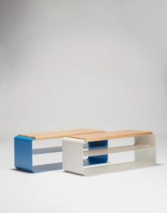 a white and blue table sitting next to each other