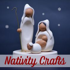 a nativity cake with two figurines on top and the words nativity crafts above it