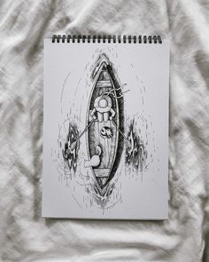 a drawing of a boat on a sheet of paper