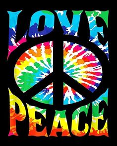 a peace sign painted in rainbow colors with the words love and peace written below it