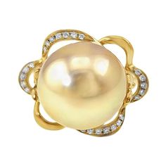 18K Yellow Gold South Sea Pearl Golden Pearl Ring with Diamonds 1 South Sea Golden Pearl - 12.5mm 24 Diamonds - 0.08 CT Daily Wear & Unique Engagement Ring & Wedding Anniversary Ring & Mother-Daughter Gift This exquisitely beautiful ring combines the rich, golden hue of South Sea pearls with the refined elegance of 18K yellow gold, accented by the dazzling sparkle of diamonds. Every intricate detail is the result of masterful craftsmanship, imbuing this piece with an unparalleled sense of sophis Fine Jewelry Yellow Gold Pearl Ring With High Luster, Luxury Handmade Yellow Gold Pearl Ring, Luxury Modern Yellow Gold Pearl Ring, Luxury Yellow Gold Pearl Ring With Polished Finish, Luxury Yellow Gold Pearl Ring With Cabochon, Golden Pearl, White Pearl Earring, Pearl And Diamond Ring, Fancy Yellow Diamond